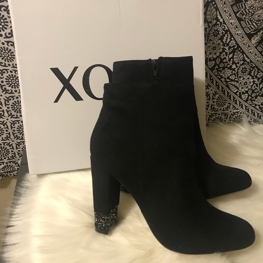 Xoxo boots. Sequins on the heel. Sexy. New in box